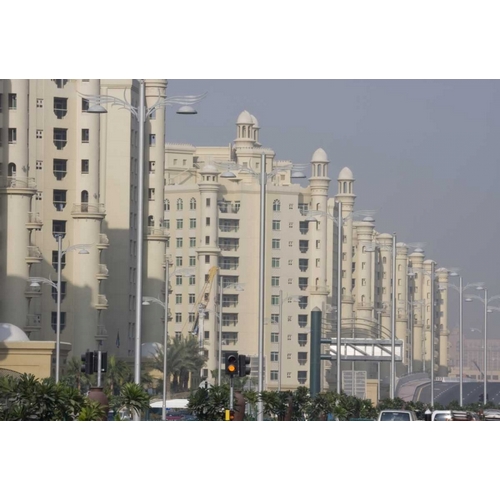 UAE, Dubai Apartment buildings next to main road